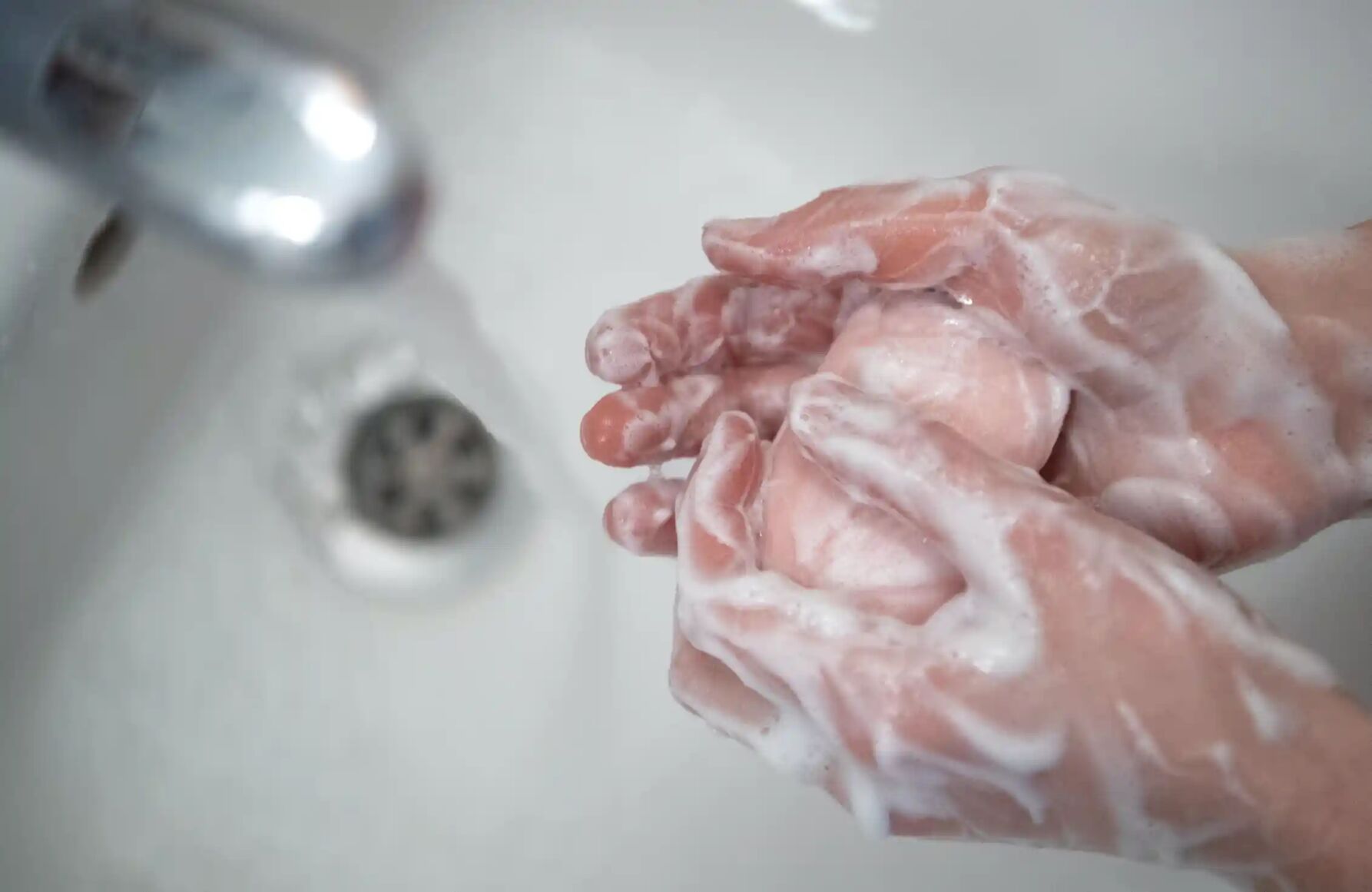 washing hands w/ soap